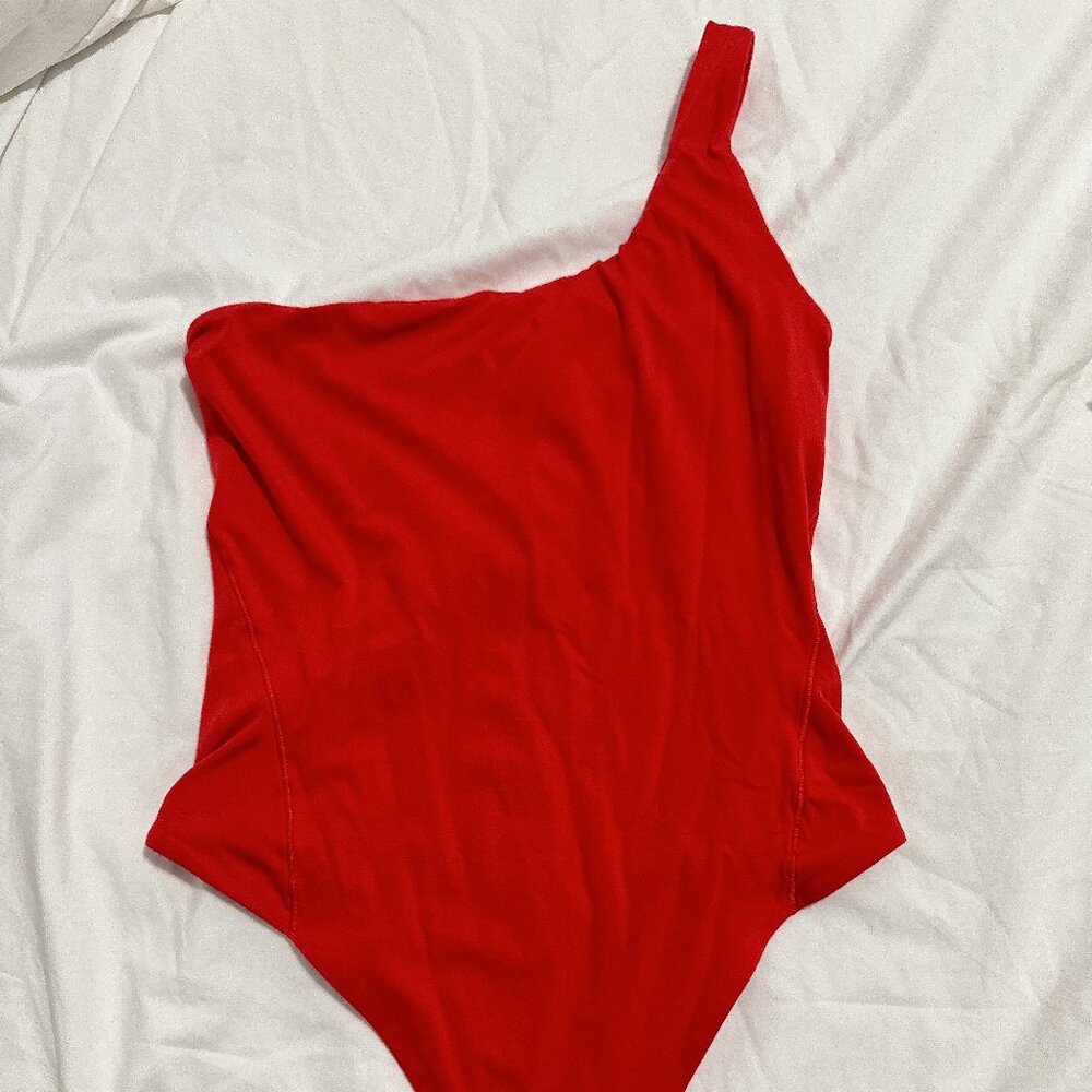 Lululemon Wundermost Ultra-Soft Nulu Asymmetrical Bodysuit in Red